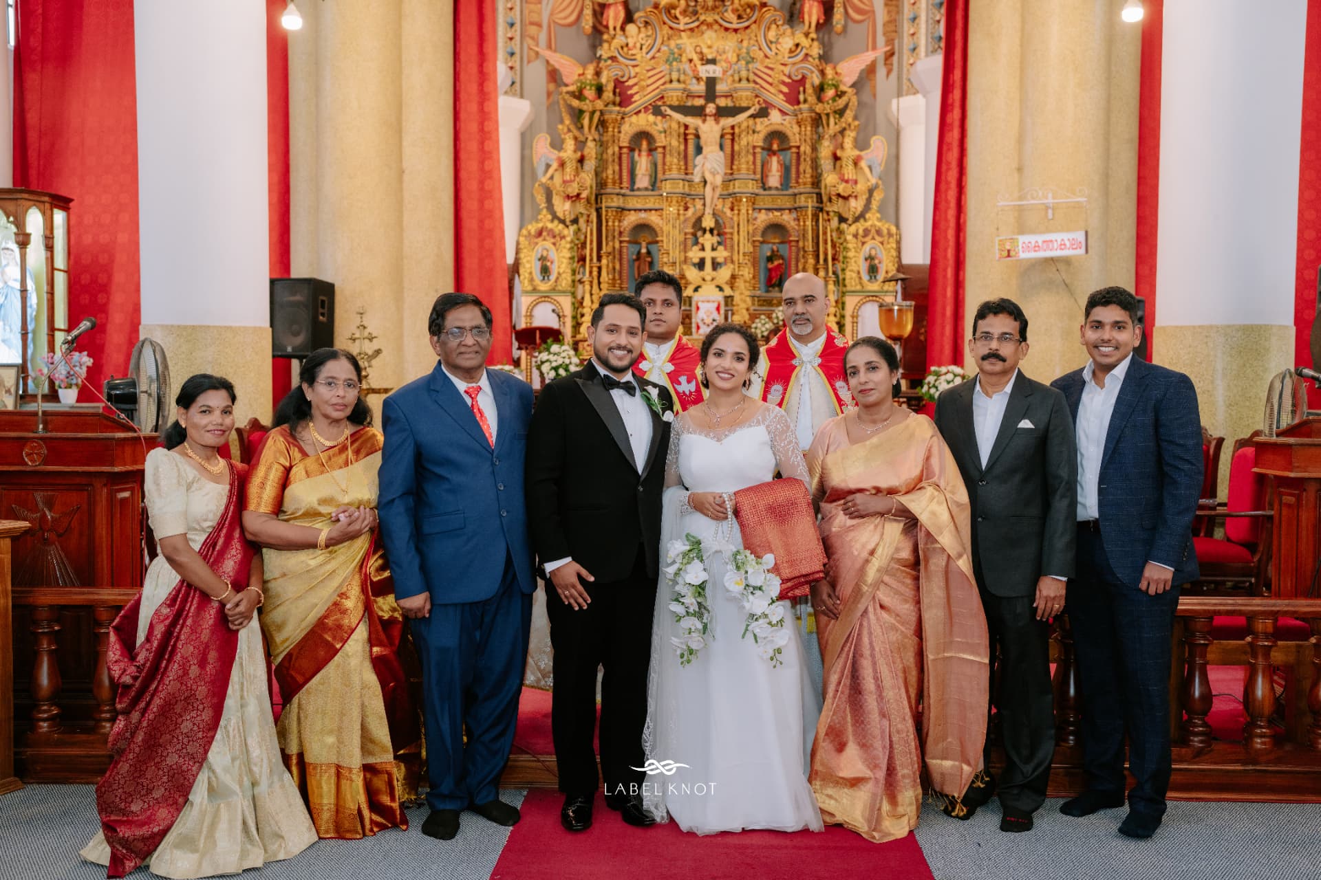 Elizabeth and Freddy with family inside the church