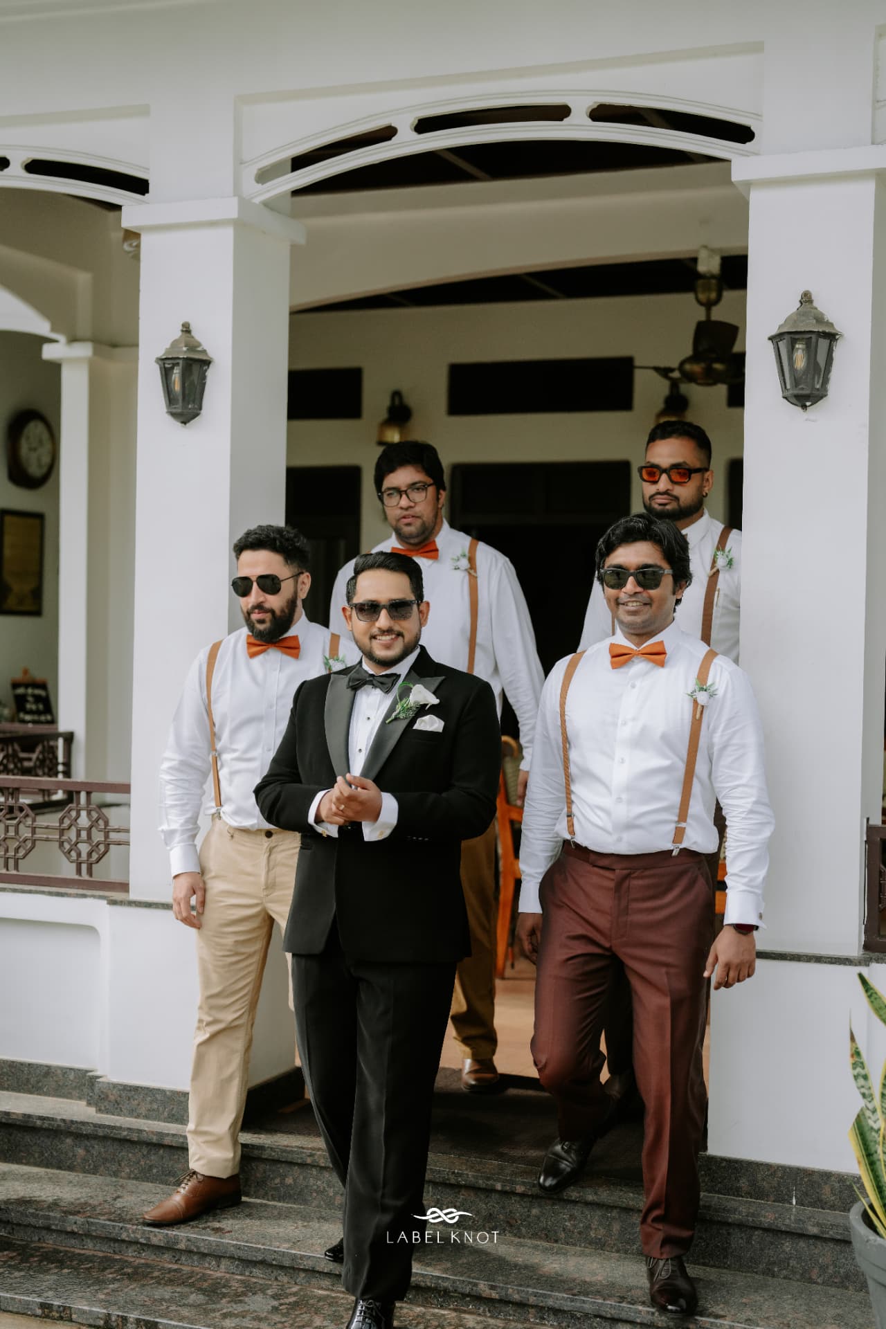 Freddy and his groomsmen leaving for the wedding